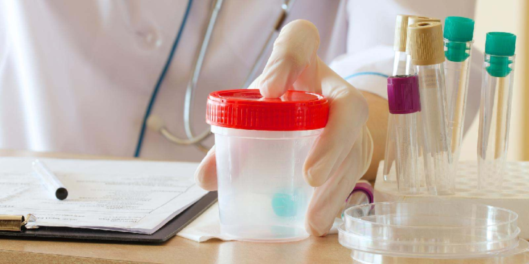 What are the causes of blood in the urine? 